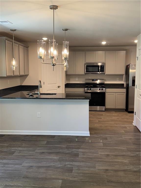 Kitchen with range, gray cabinets, a chandelier, d