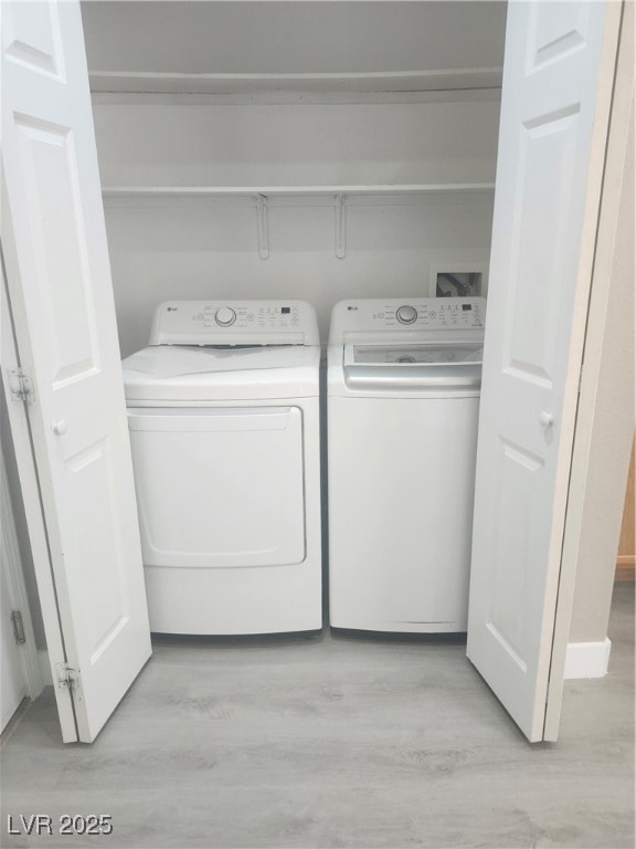 Laundry area featuring independent washer and drye