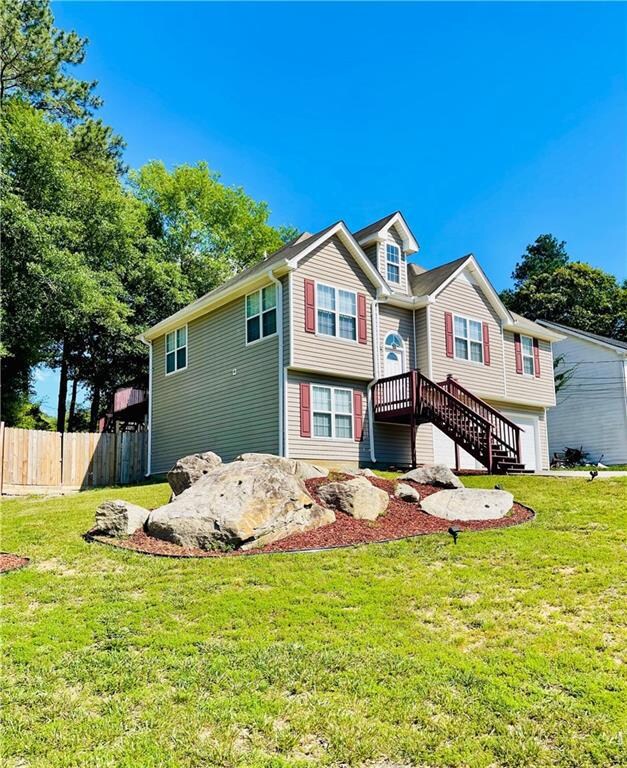 View of front of home featuring an attached garage