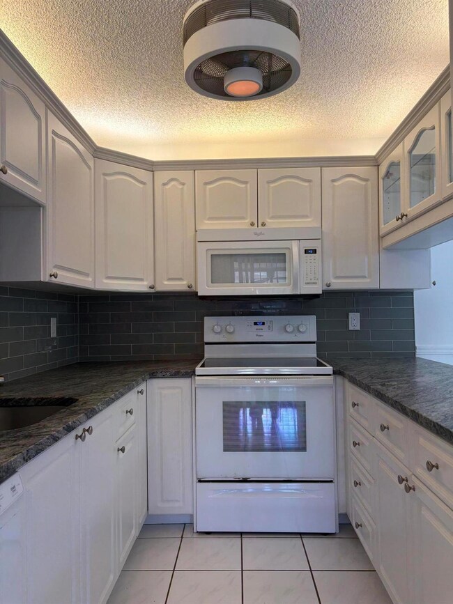 203 SE Camelot Gardens Blvd unit C, Port Saint Lucie, FL 34952 - photo 4