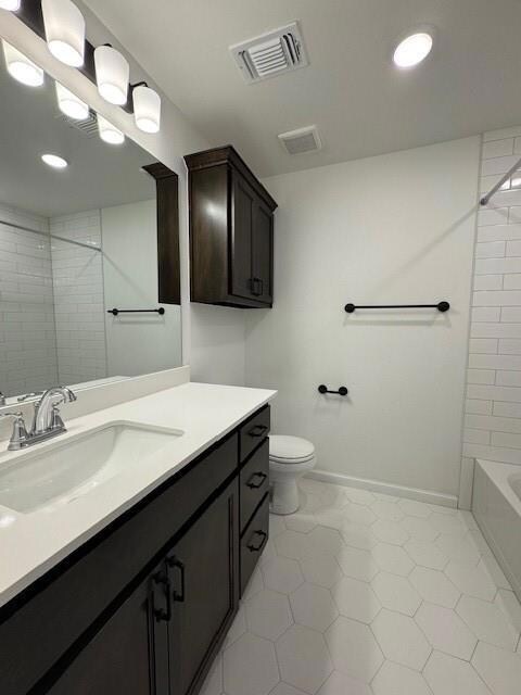 Full bathroom with vanity, tiled shower / bath, ti