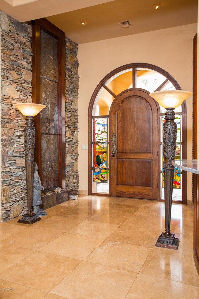 Water Wall next to African Mahogany door