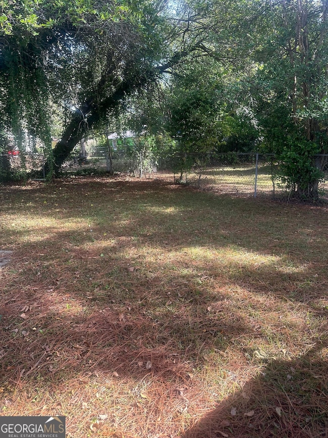 Huge fenced in back yard.