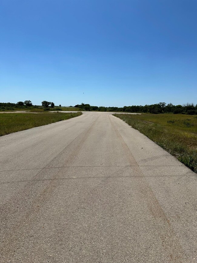 Nice paved road leading to property.