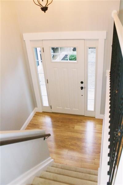 Inviting entry with custom metal rod handrail