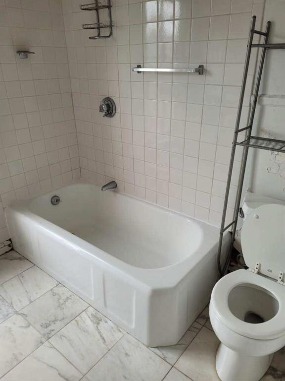 3rd Floor Apt bathroom (tiled floor)