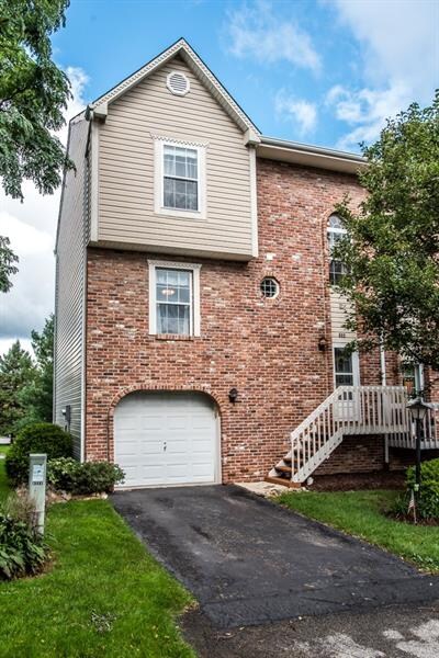 Two story townhome with one car garage.