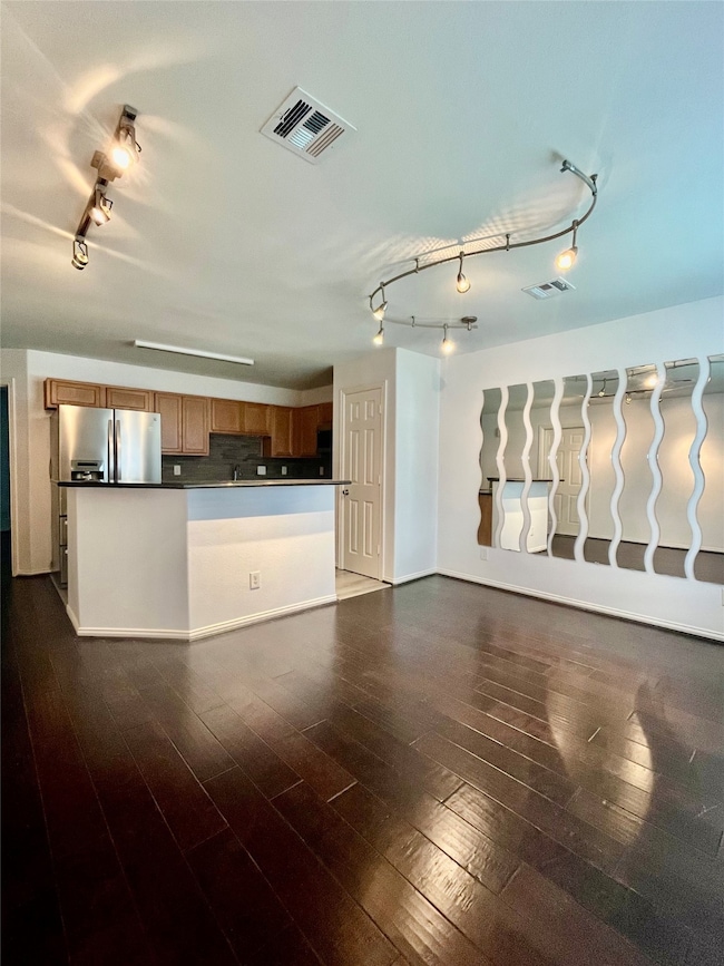 Inviting kitchen with sleek hardwood floors, moder