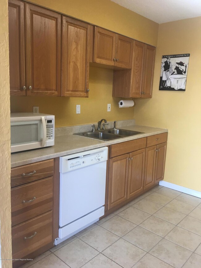 KITCHEN W/REF., STOVE, & DISHWASHER.