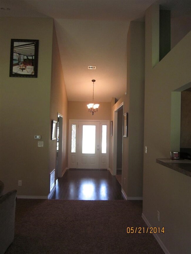 ~Warm laminate wood floors invite you inside~