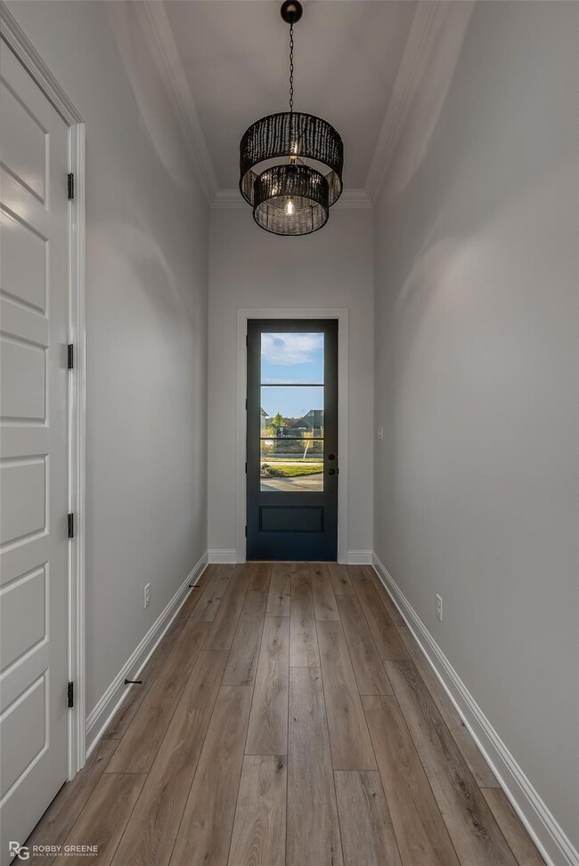 Doorway featuring hardwood / wood-style floors, a 