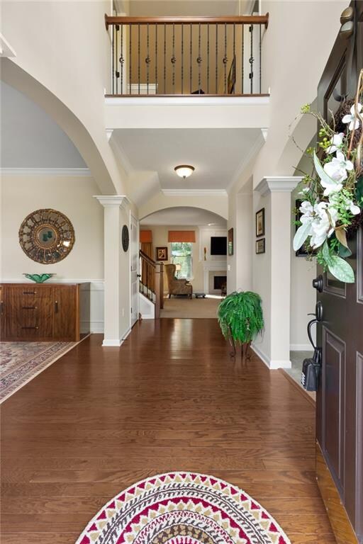 Soaring 2 Story Entry with hardwood flooring