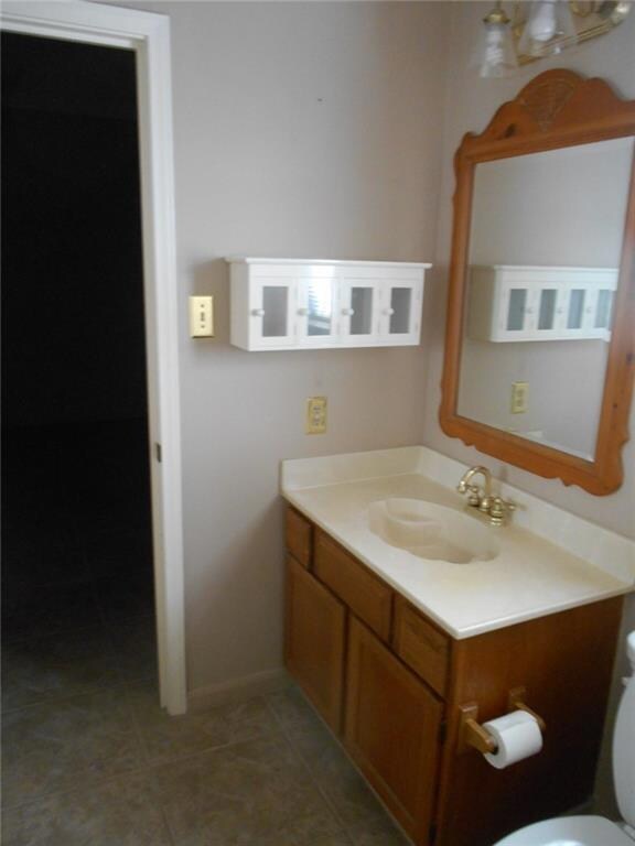 MASTER BEDROOM HALF-BATH  attaches to private bath