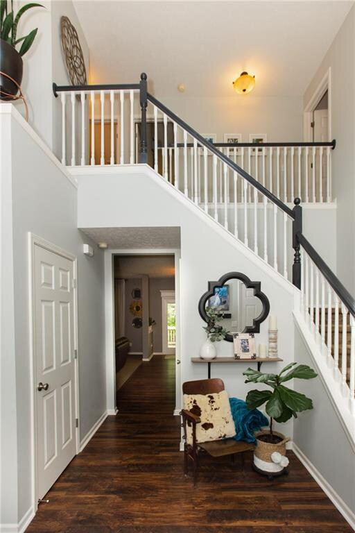 Entryway foyer looks up onto upper level.