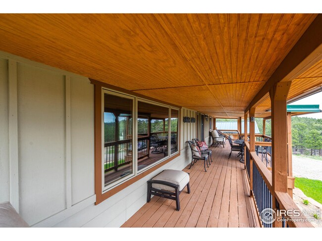 Front of home features large picture window with views of Carter Lake