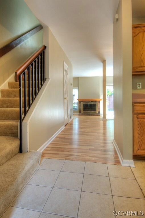 Entry way with tile and closet