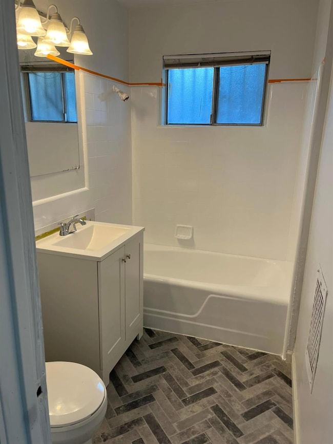 Unit A bathroom - before tenants