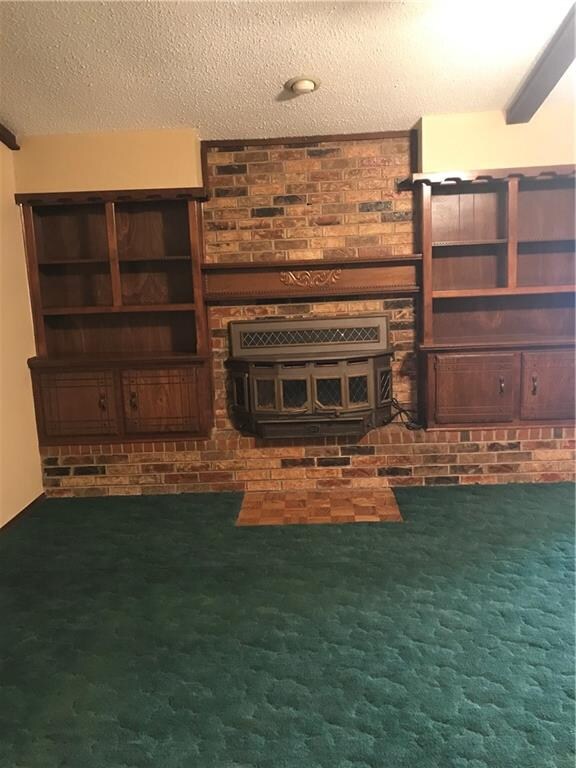 Vaulted ceiling, ceiling fan,  living room with wo