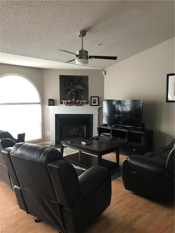 Vaulted ceilings, lots of light, multiple windows, gas fireplace.