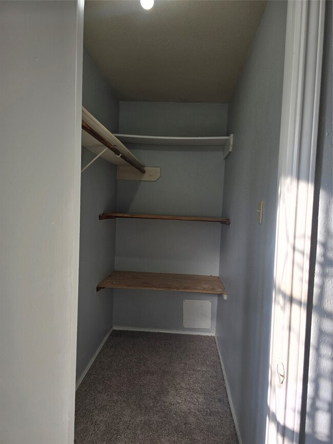 Nice Size Walk-In Closet w added Shelving for extra storage space!