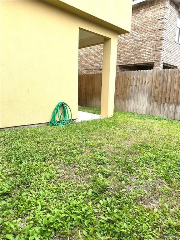 View of yard with a patio area