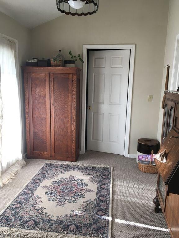 Charming foyer area and front entry of house, thro