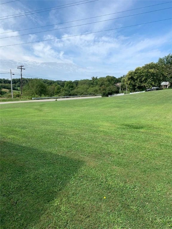 YOU EXPANSIVE SIDE YARD!  PERFECT FOR VOLLEY BALL,