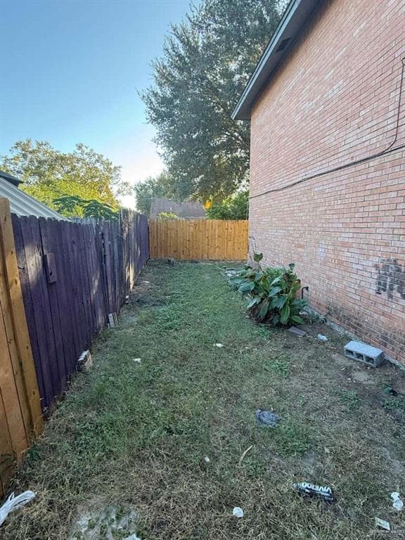 View of fenced backyard