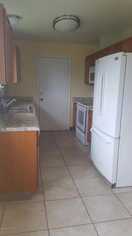 Galley Kitchen Exists to Yard