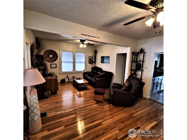 230 SIDE LIVING ROOM FROM FRONT DOOR, KITCHEN TO FAR RIGHT - HALLWAY DOOR TOWARD BATHROOM AND BACK BEDROOM