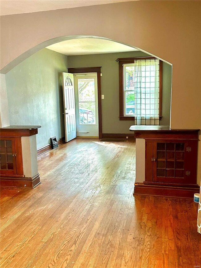 Dining Room view to Living Room with built in book