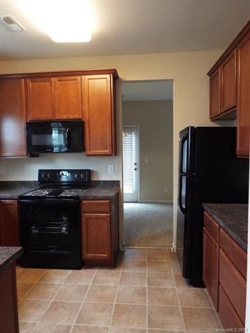 Kitchen leading to formal dining room