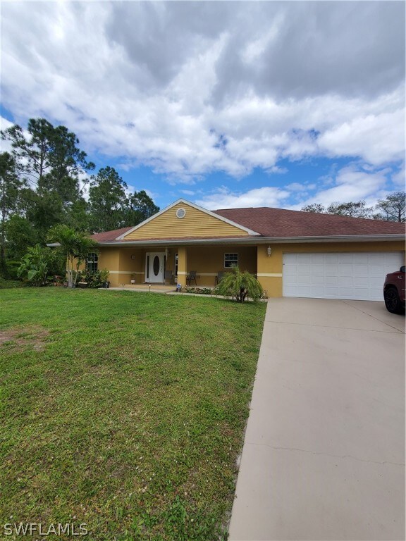 441 Broadmoor St, Lehigh Acres, FL 33974 - photo 3