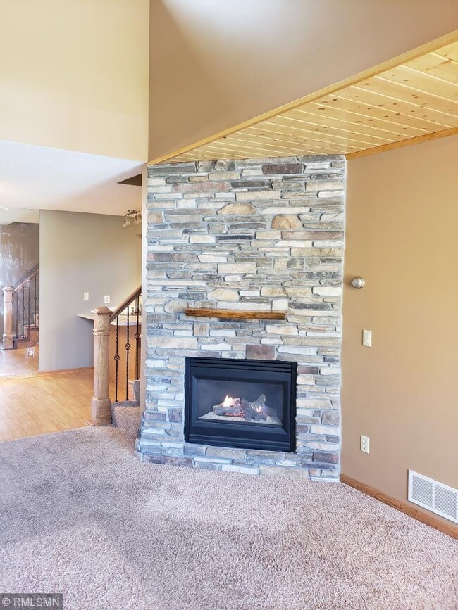 Custom stone faced fireplace