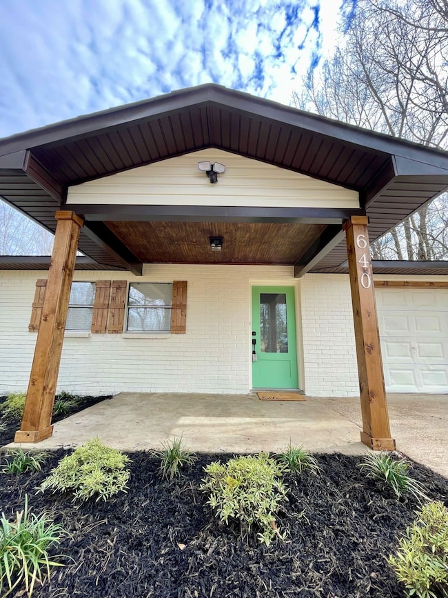 View of front of home with a garage