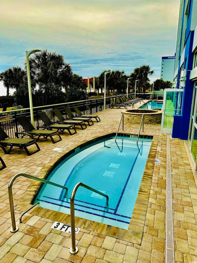 Pool with a patio area