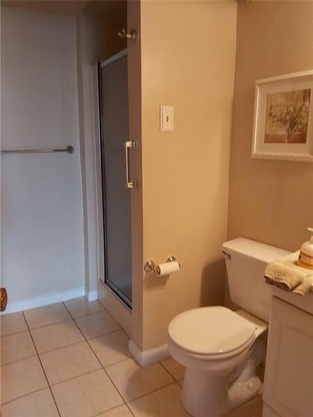 Entry Level Full Bath adjacent to game room, den, laundry room and foyer; ceramic tile, shower, vanity
