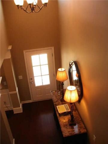 Dramatic two story foyer as you walk in.