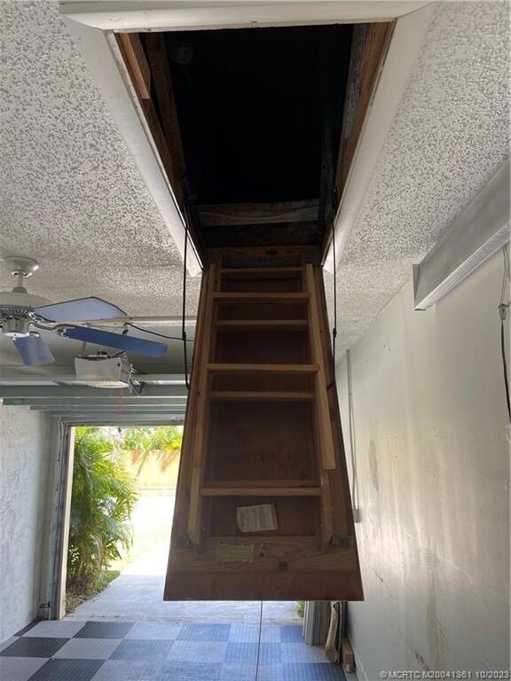 Walk-up attic storage.