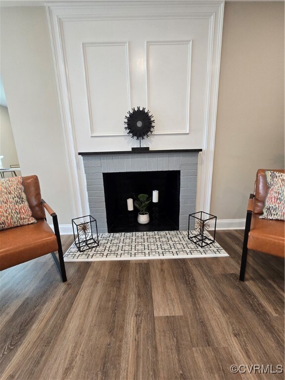 Interior details with baseboards, wood finished fl