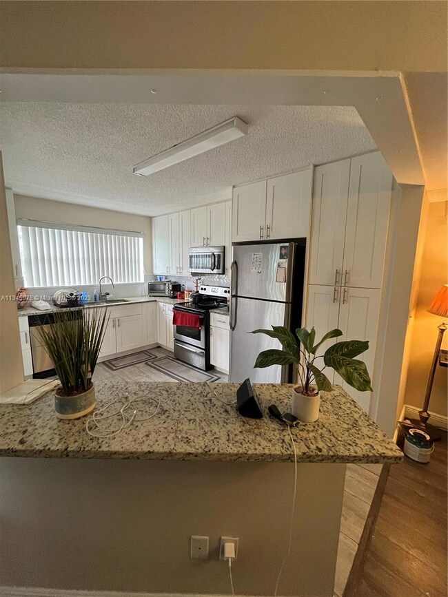 Renovated kitchen with snack bar
