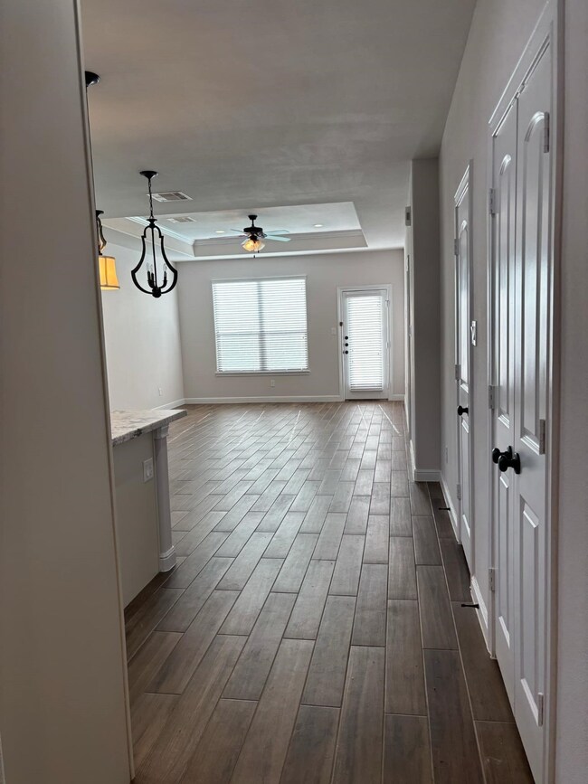 Glimpse of the Light and Bright Family Room from E