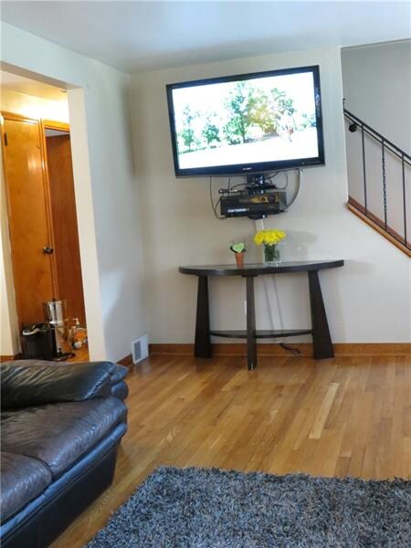 Hardwood floors abound in this lovely home.