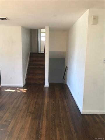 Down to the lower level family room and 1/2 bathUp to 3 bedrooms and 2 full baths