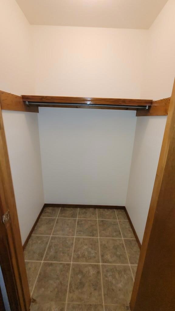BEDROOM WALK IN CLOSET