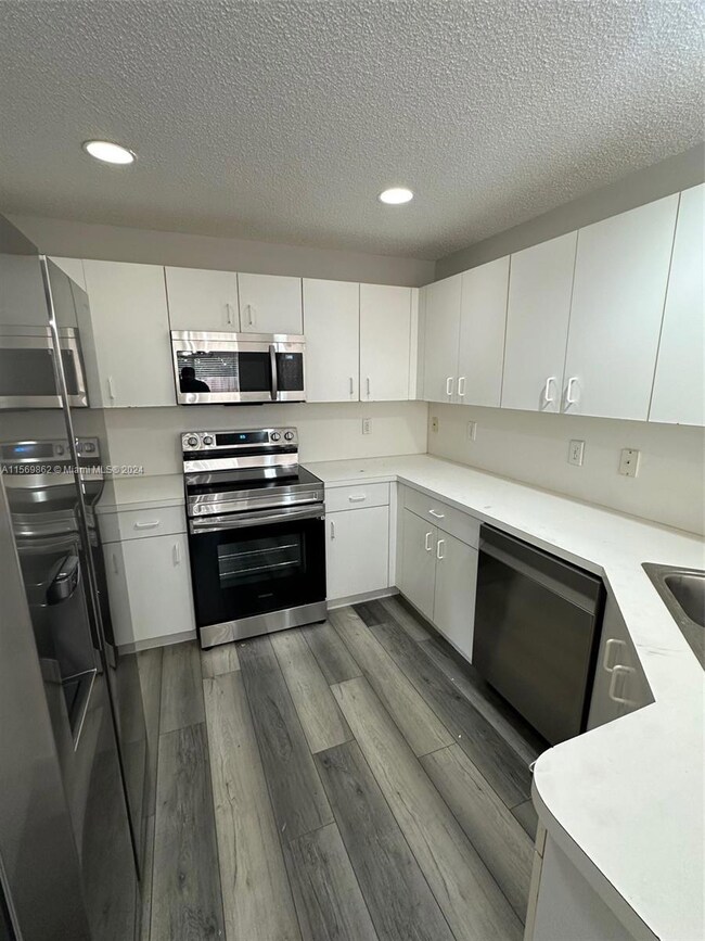 11557 NW 51st Ln, Doral, FL 33178 - photo 7