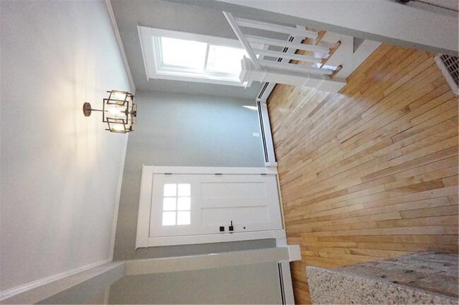 Front foyer with new front door,...