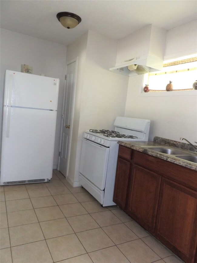 Kitchen also comes with refrigerator