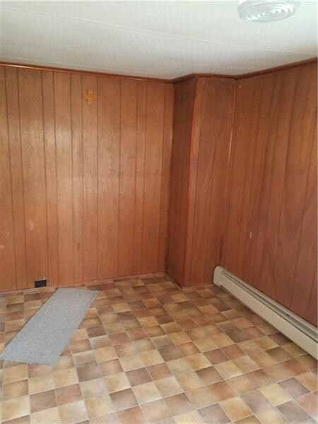 DEN 1ST FLOOR WITH ACCESS TO SIDE YARD.