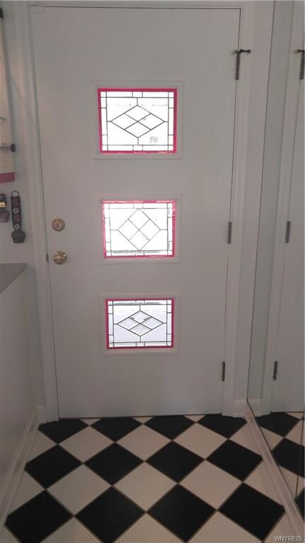 Classic black and white ceramic tiled flooring and